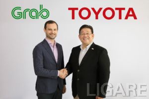 12月18日会見を行った、TMAP・松田進社長(右)とGrabのHead of Regional Operations・Russell Cohen氏(左)
